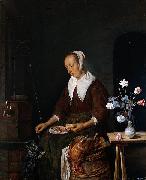 Gabriel Metsu Woman feeding a cat oil